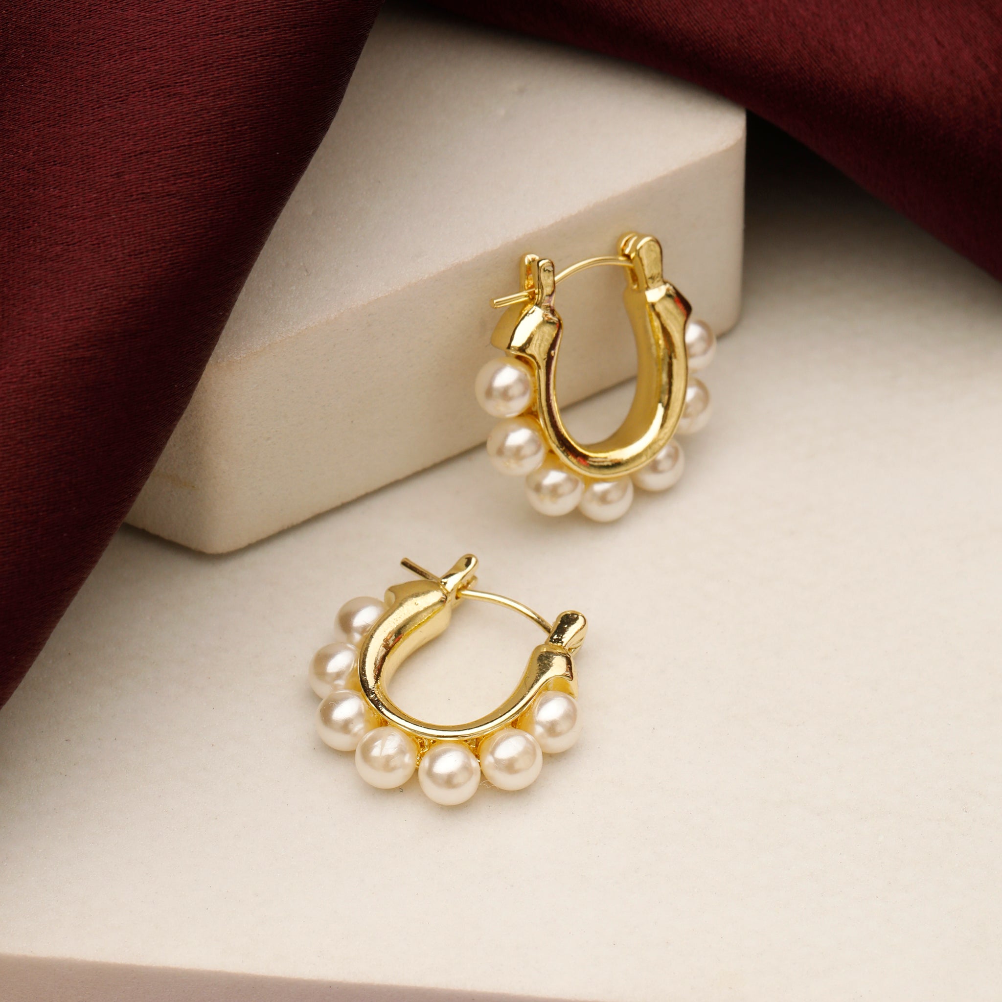 Radiant pearl hoops