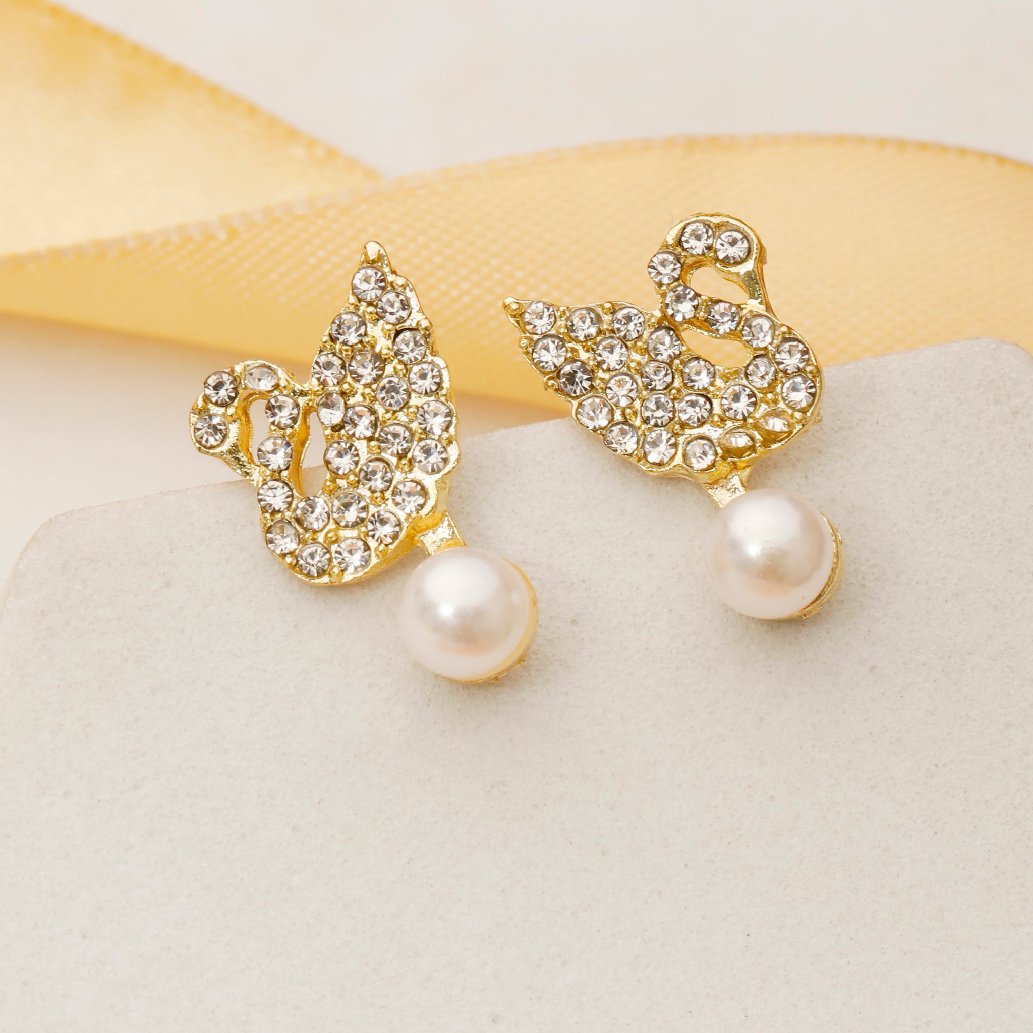 Swan studs